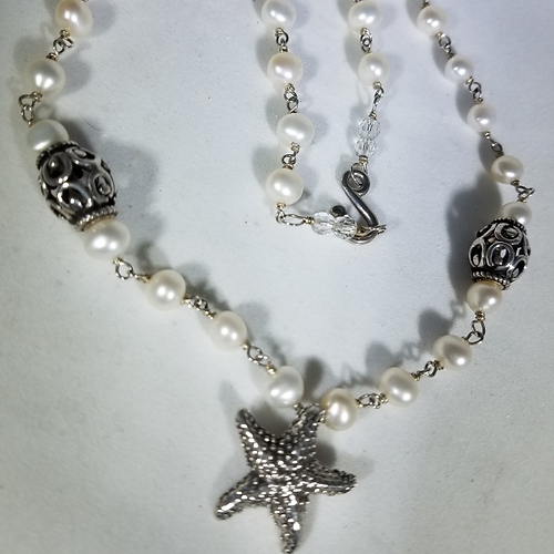 wire wrap pearl necklace with starfish pendant