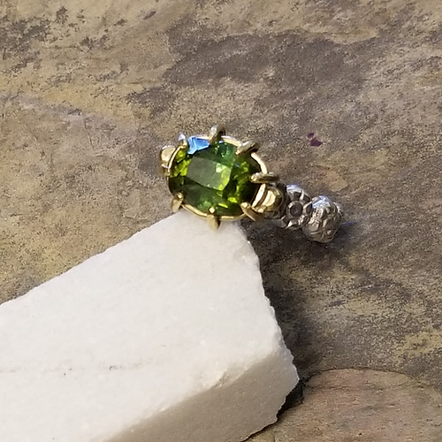 green tourmaline gold and sterling silver ring