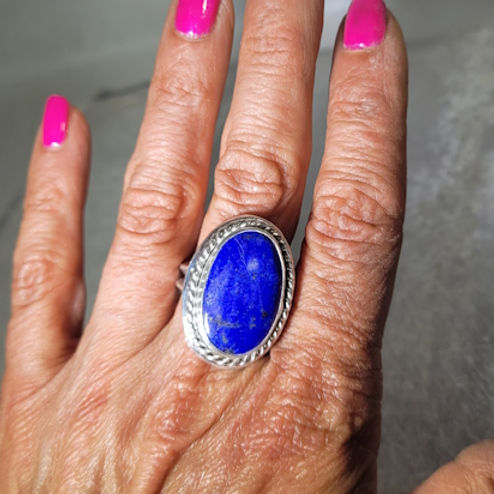 sterling silver lapis ring on finger