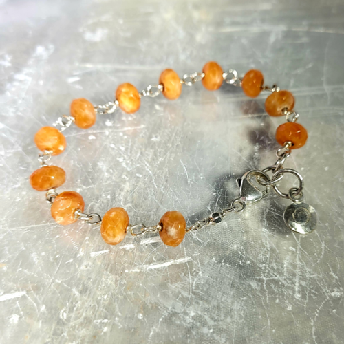 faceted orange calcite sterling silver bracelet