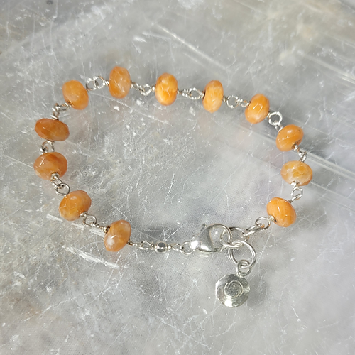 faceted orange calcite sterling silver bracelet